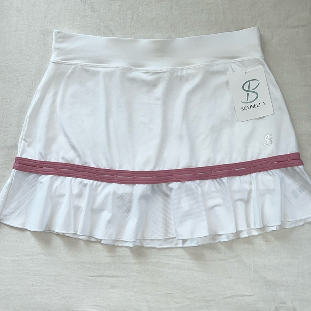 New Sofibella tennis skort. White with pink line. Length: 14”